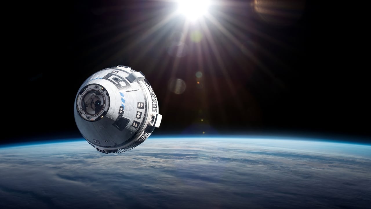 Starliner spaceship in space.